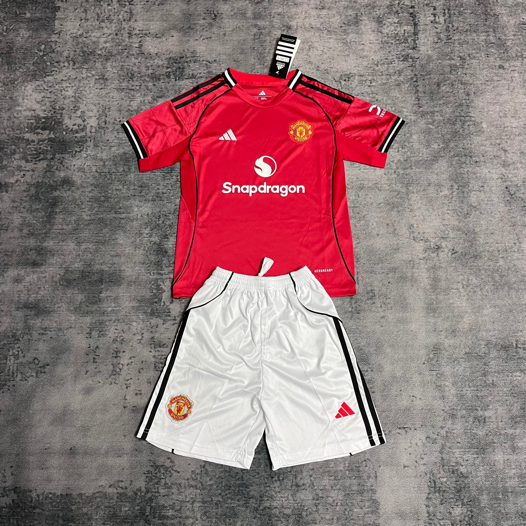 Kit Infantil Manchester United 2025/26 - Home