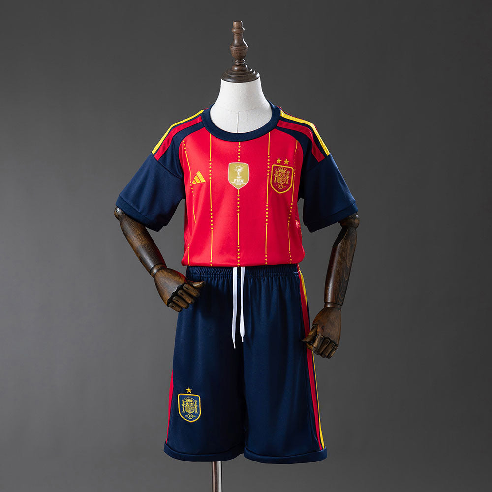 Kit Infantil Espanha Home Copa 2026 - 2 estrelas + Patch Campeã Copa do mundo