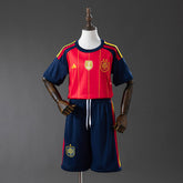 Kit Infantil Espanha Home Copa 2026 - 2 estrelas + Patch Campeã Copa do mundo